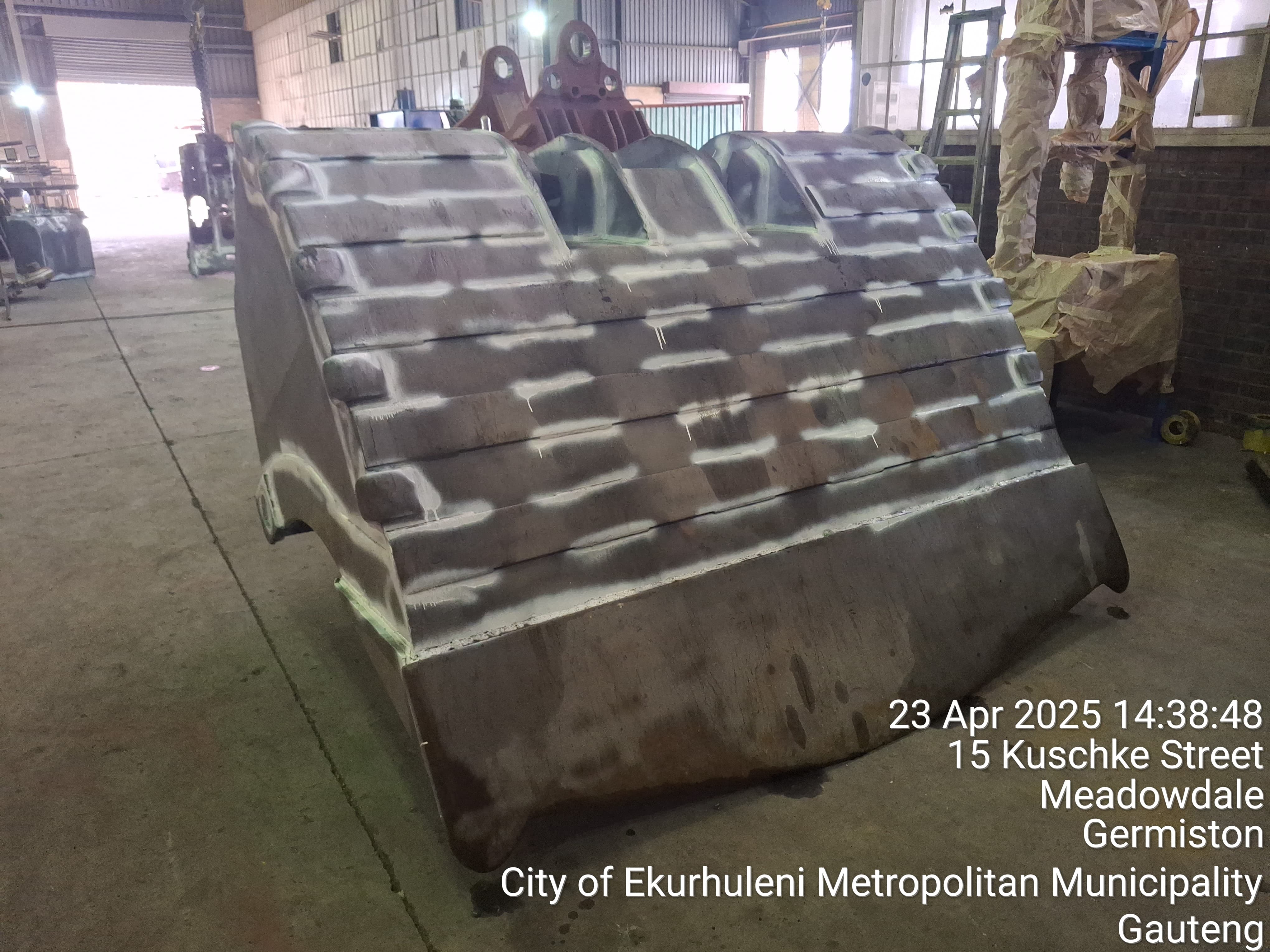 Magnetic particle testing in progress